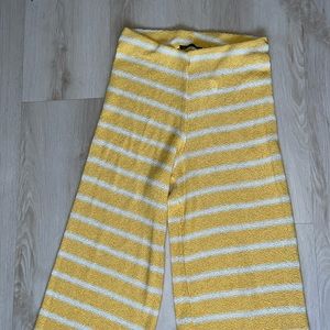 Yellow and white striped knitted flared pants